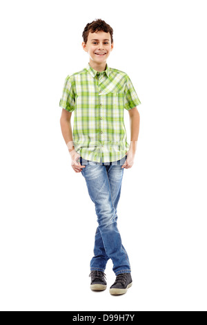 teen boy standing legs crossed on white background Stock Photo - Alamy