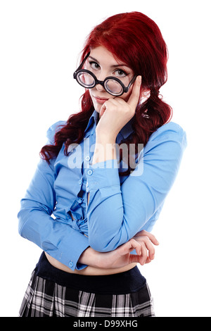 Pensive young schoolgirl in cloeup pose, isolated on white background Stock Photo