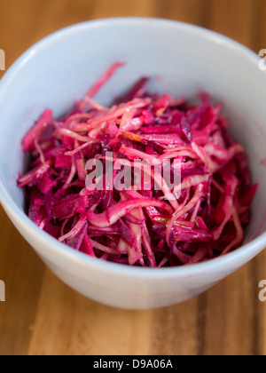 Raw cabbage and beetroot slaw dressed in rice vinegar Stock Photo