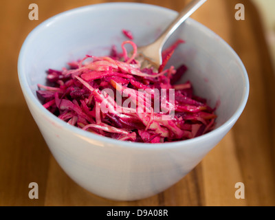Raw cabbage and beetroot slaw dressed in rice vinegar Stock Photo