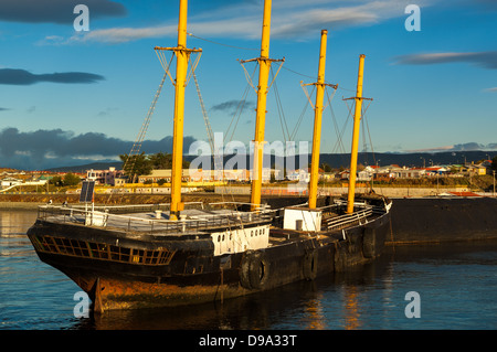 Ship lit by sunrise in punta arenas Stock Photo