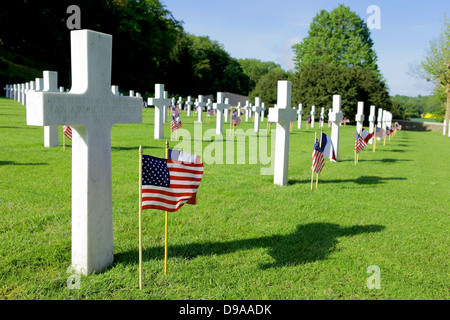 American flags mark the graves of US soldiers killed in the historic First World War battlefield of Belleau Wood in honor of Memorial Day at the Aisne-Marne American Cemetery May 28, 2013 in Belleau, France. Stock Photo