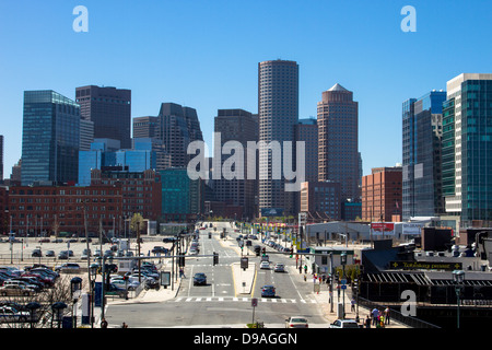 Downtown Boston skyline and Seaport Boulevard as seen from Seaport District in daylight Stock Photo