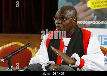 Enniskillen, United Kingdom. 16th June 2013. The Most Reverend John Sentamu, the Archbishop of York, talks at the press conference after the service. The Most Reverend John Sentamu, the Church of England Archbishop of York led a church service for the 'Enough food for everyone if' campaign in the Cathedral of Enniskillen. John Sentamu called in his sermon for action against government corruption and poverty. Credit:  Michael Debets/Alamy Live News Stock Photo