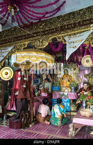 People praying Popa Taungkalat monastery on Mount Popa near Bagan Burma Myanmar Stock Photo