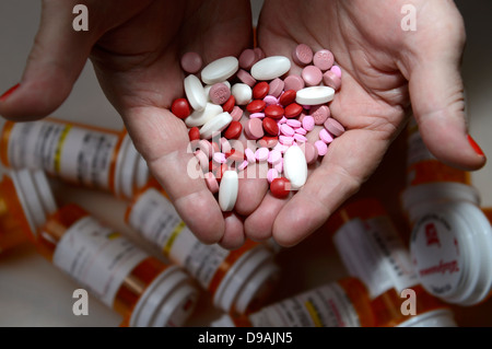 Medications, including Depakote, taken by a chronically ill patient. Stock Photo