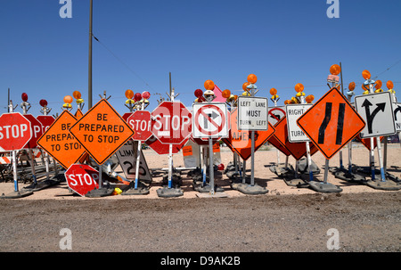 Traffic control signs await placement at a road construction site, Tucson, Arizona, USA. Stock Photo