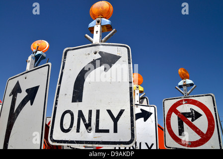 Traffic control signs await placement at a road construction site, Tucson, Arizona, USA. Stock Photo