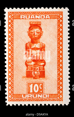 Postage stamp from Ruanda-Urundi depicting a carved figure from the Baluba tribe. Stock Photo