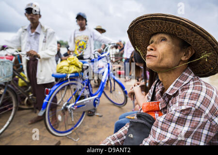 June 14, 2013 - Pathein, Ayeyarwady, Union of Myanmar - Passengers on a cross river ferry in Pathein. Pathein, sometimes also called Bassein, is a port city and the capital of the Ayeyarwady Region, Burma. It lies on the Pathein River (Bassein), which is a western branch of the Irrawaddy River. It's the fourth largest city in Myanmar (Burma) about 190 km west of Yangon. (Credit Image: © Jack Kurtz/ZUMAPRESS.com) Stock Photo