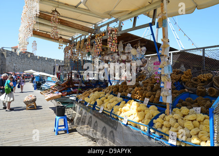 Souvenir stall on fishing boat, Kolona Harbour, Old Town, City of Rhodes, Rhodes, Dodecanese, Greece Stock Photo