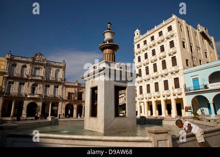 fountain at the old town square Plaza Vieja in Havana, Cuba, Caribbean Stock Photo