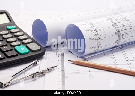 Construction plan blueprints with drafting tools Stock Photo