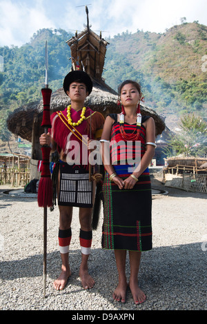 Naga tribal couple standing together in traditional outfit, Hornbill Festival, Kohima, Nagaland, India Stock Photo