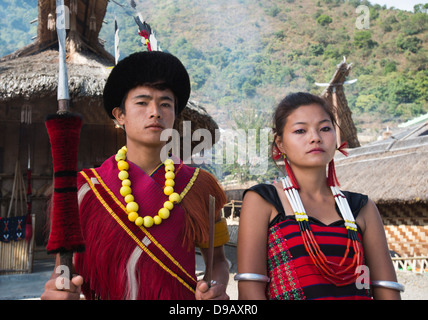 Naga tribal couple standing together in traditional outfit, Hornbill Festival, Kohima, Nagaland, India Stock Photo