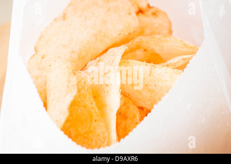 Close up opened bag of potato chips Stock Photo