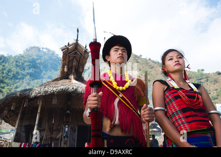 Naga tribal couple standing together in traditional outfit, Hornbill Festival, Kohima, Nagaland, India Stock Photo