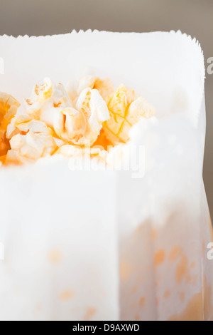 Fresh classic butter popcorn in paper bag Stock Photo