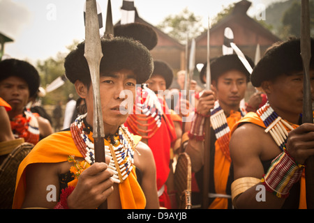 Naga tribal warriors in traditional outfit with spear, Hornbill Festival, Kohima, Nagaland, India Stock Photo