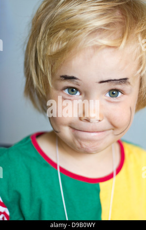 Portrait of girl with painted face, smiling, close up Stock Photo