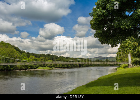 SUSPENSION BRIDGE OVER THE RIVER SPEY AT ABERLOUR WITH A SALMON FISHERMAN Stock Photo