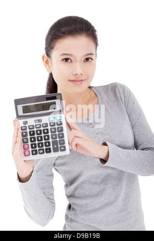 Use calculator to Eastern young woman Stock Photo