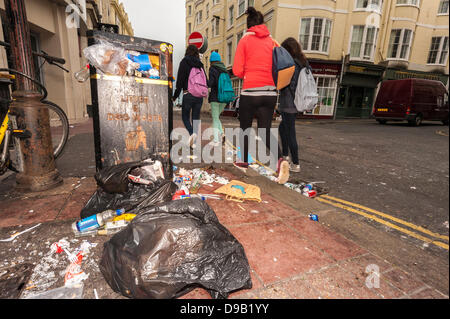 Brighton, UK. 17th June, 2013. Sin Bin City -Rubbish strewn East Street in Brighton.  The city's cleaners are on strike against pay cuts. photo Credit: Julia Claxton/Alamy Live News Stock Photo