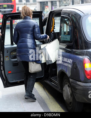 Stacey Solomon and boyfriend Aaron Barnham after shopping at 'Mamas & Papas' London, England - 09.02.12 Stock Photo