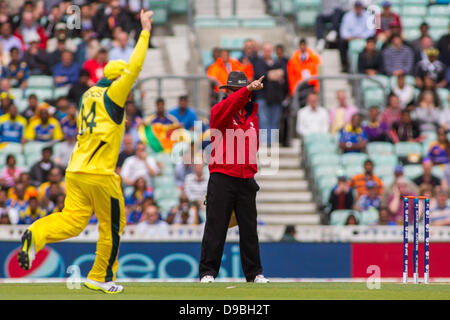 London, UK. 17th June, 2013. Umpire  Tony Hill  signals out for Sri Lanka's Kusal Perera of the bowling of Mitchell Johnson (not pictured) during the ICC Champions Trophy international cricket match between Sri Lanka and Australia at The Oval Cricket Ground on June 17, 2013 in London, England. (Photo by Mitchell Gunn/ESPA/Alamy Live News) Stock Photo