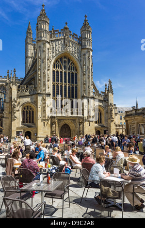 Bath, England, UK - people at cafes outside the Abbey / Cathedral in the city centre, Bath, Somerset, UK Stock Photo