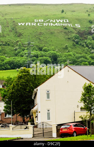 Belfast, Northern Ireland. 17th June 2013. On the opening day of the G8 summit in Fermanagh, Republicans place a giant sign on the side of Black Mountain which reads 'G8/NWO War Criminals' Credit:  Stephen Barnes/Alamy Live News Stock Photo