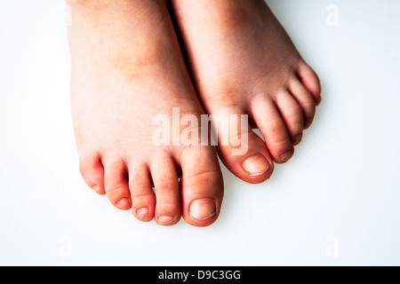 Four year old boy's feet Stock Photo