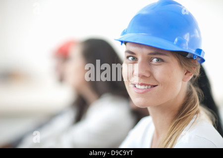 Female laborer smiling Stock Photo