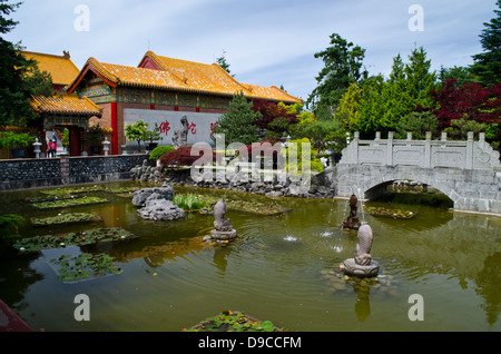 Bridge and pond in the Classical Chinese garden at the International Buddhist Temple, Richmond, British Columbia, Canada.(Greater Vancouver) Stock Photo