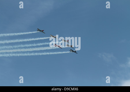 6 Russian Yak aircraft flyng in formation. Cosford Airshow 2013 Stock Photo