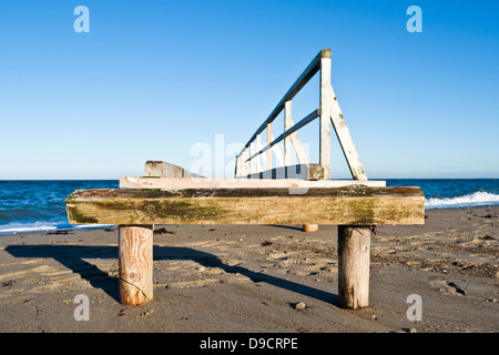 Wooden footbridge on the beach Stock Photo