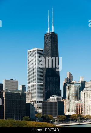 Hancock building in Chicago presented in portrait with beautiful clear blue sky background. Stock Photo