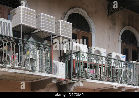 Many air conditioning compressor units outside of a building. Stock Photo