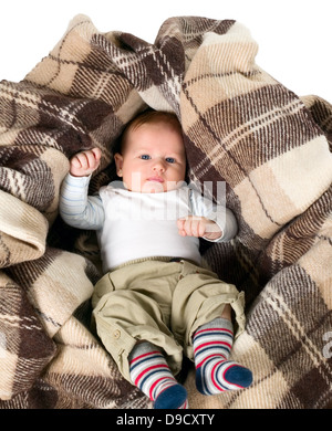 Baby boy is in the box with furry blanket Stock Photo