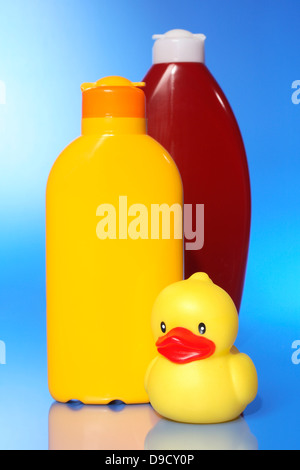 Solar milk, lotion and elastic duck Stock Photo