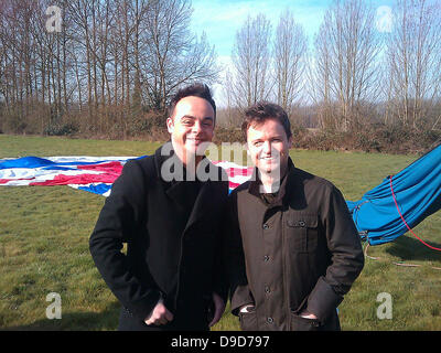 Anthony McPartlin, Declan Donnelly Ant and Dec pose for the camera after they crashed their hot air balloon into a field in Kent. They were doing a stunt for Children in Need and on landing it went horribly wrong and the balloon got caught up in the trees and they had to call out for help before be rescued by a near by builder. Kent, England - 24.03.11 Stock Photo