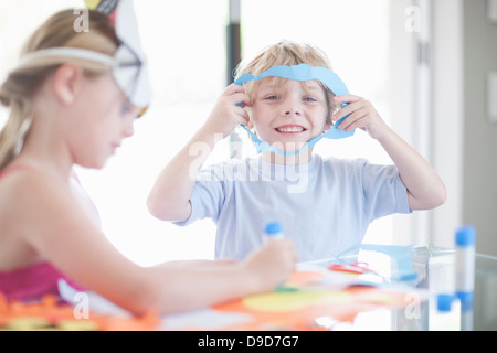 Children's mask making party Stock Photo