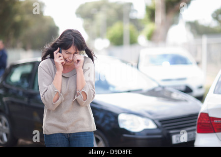 Woman crying after car accident