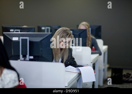Students using computers in class Stock Photo