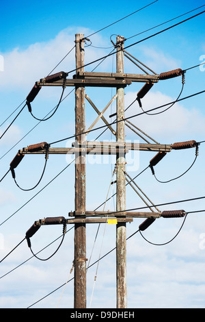 Cables connected to telegraph pole Stock Photo