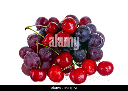 cherries and grape isolated on white background studio shot Stock Photo