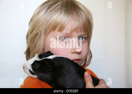 Boy with Guinea Pig Stock Photo