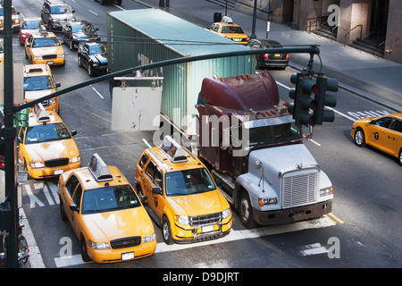 Yellow taxis waiting at traffic lights, New York City, USA Stock Photo