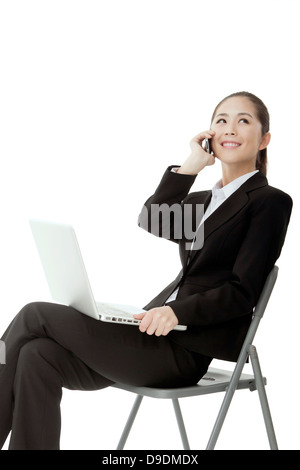 Business lady in the use of notebook computer Stock Photo