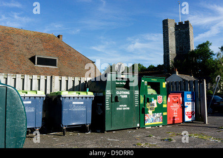 Recycling bins in a village car park. Stock Photo